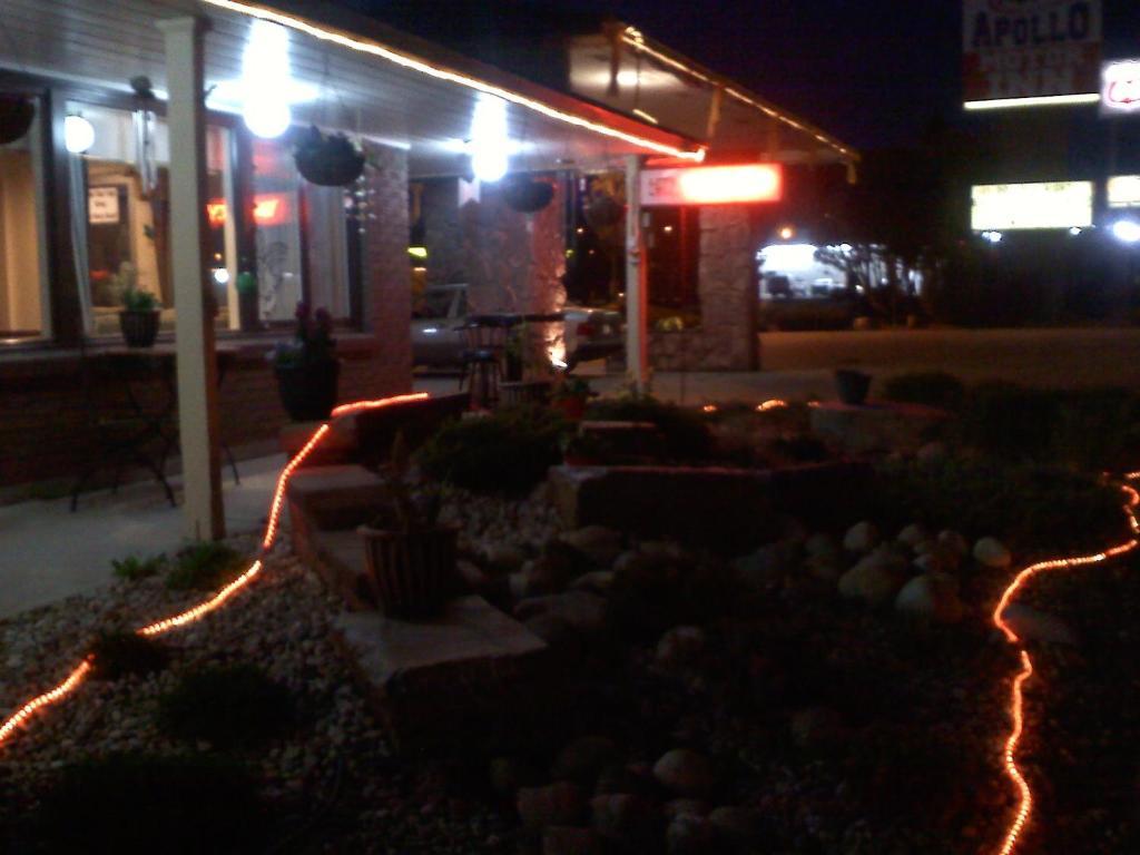Apollo Motor Inn office at night with string lights