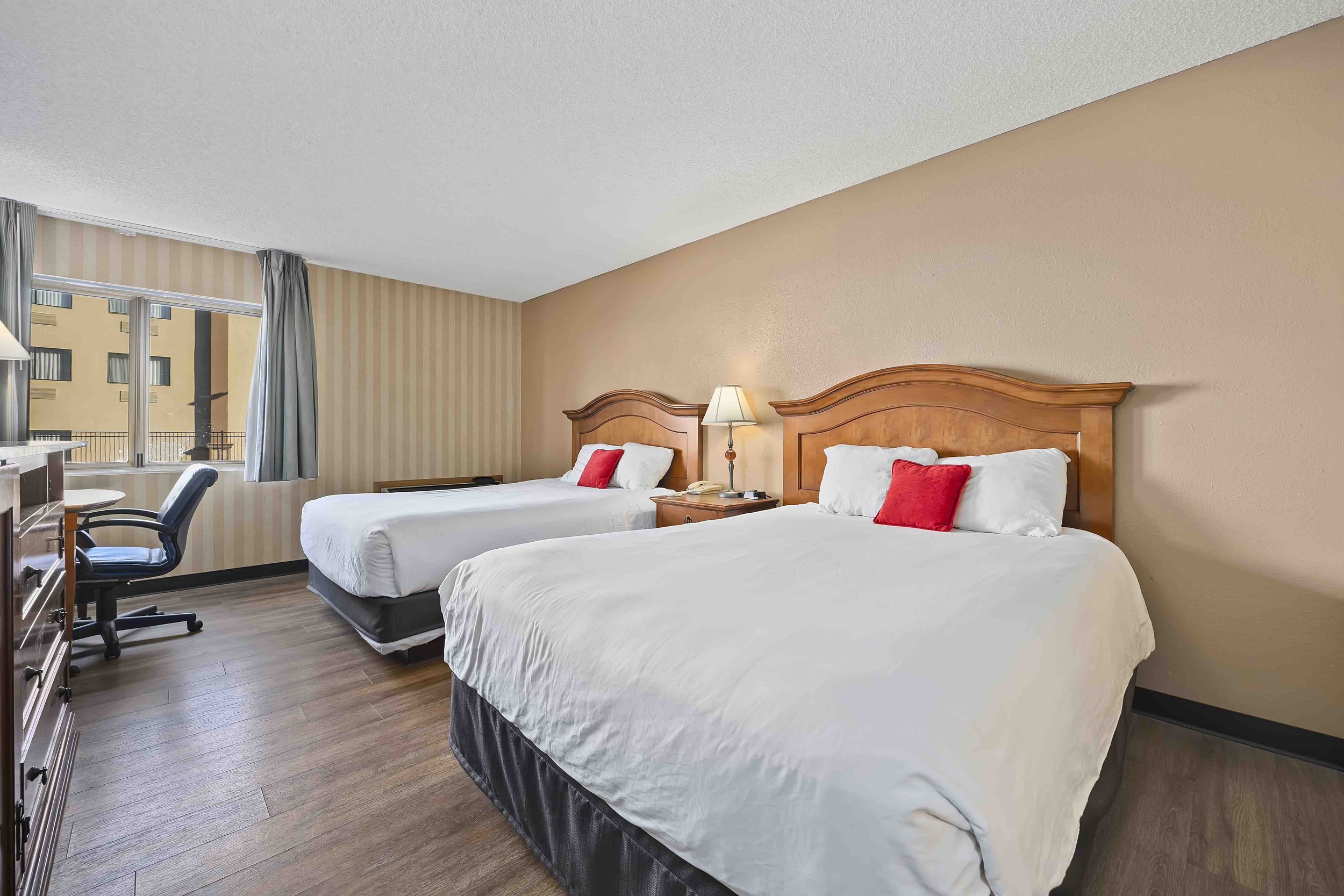 Main Avenue Extended Stay room with two queen beds